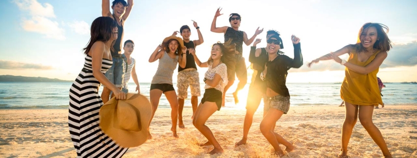 Happy young people on beach