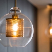 Vintage luxury interior lighting with bronze plate and transparent glass bulb