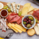 A styled charcuterie or snack board on a dining table